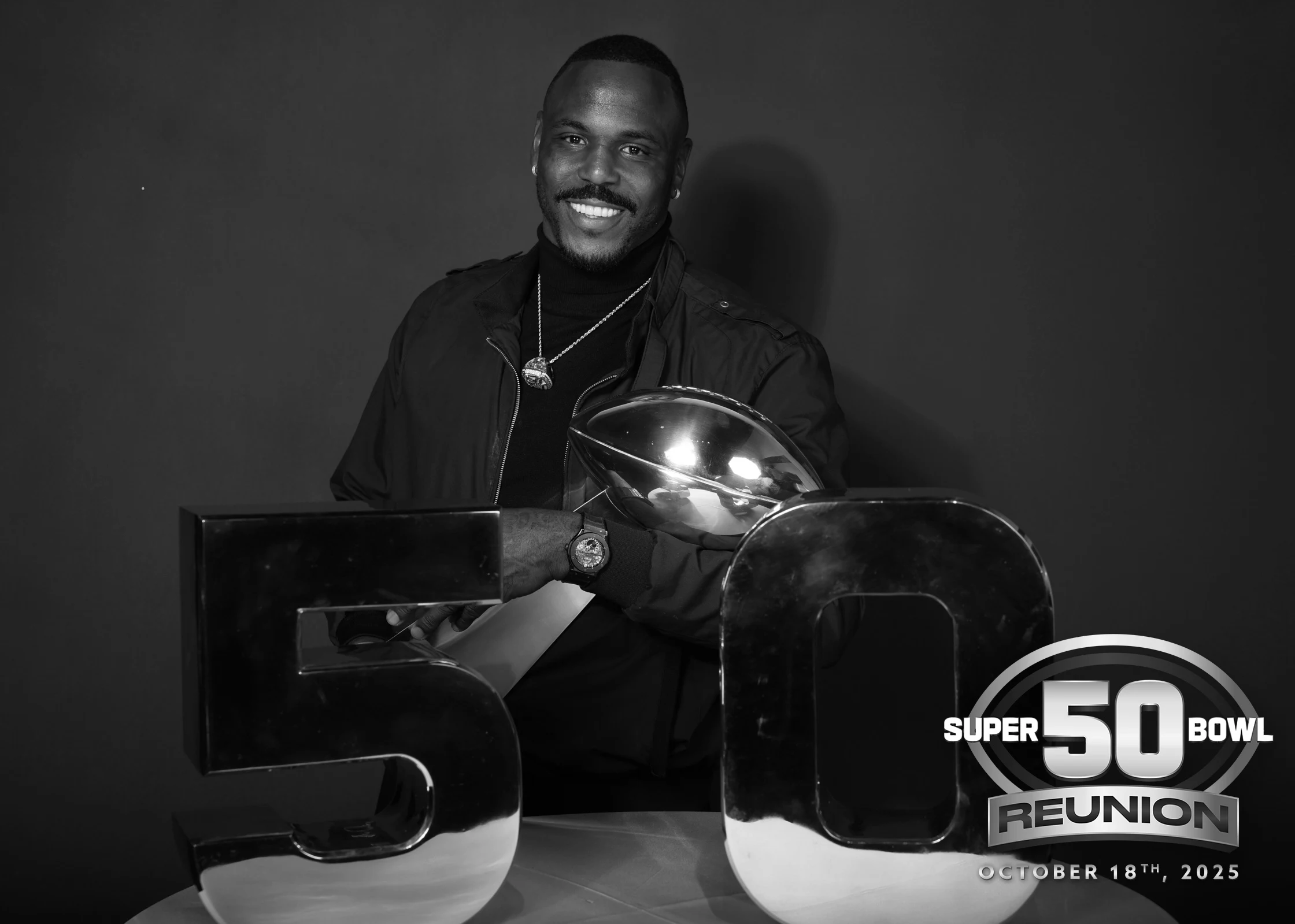 Malik Jackson holding the Super Bowl 50 trophy