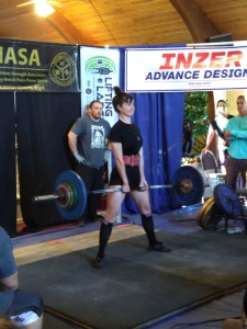 Cameron Rasmussen at the top of a deadlift on the NASA platform